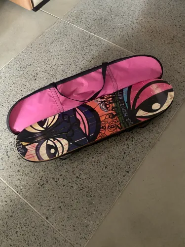 Skate feminino com bolsa de transporte 