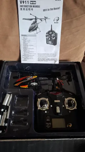 V911 com um servo queimado,para aproveitar peças ou arrumar ,completo