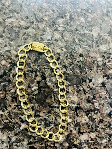 Vendo Peça em ouro