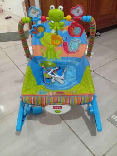 Cadeirinha de descanso musical Fisher price 