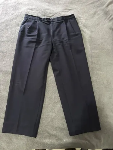 Calça de alfaiataria azul escuro