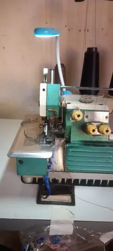 vendo overloque com elastiqueira