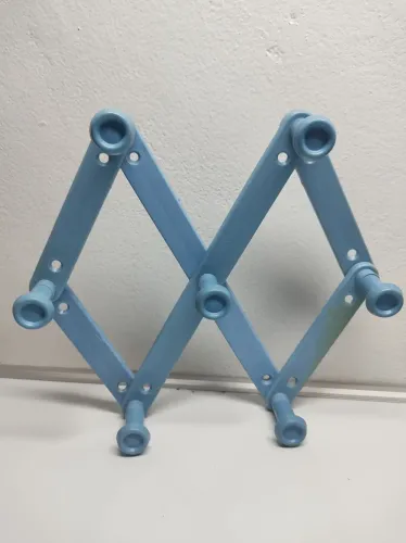 Arara de parede expansível azul
