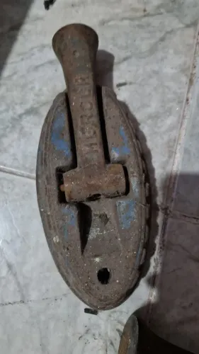 Escovao antigo de ferro