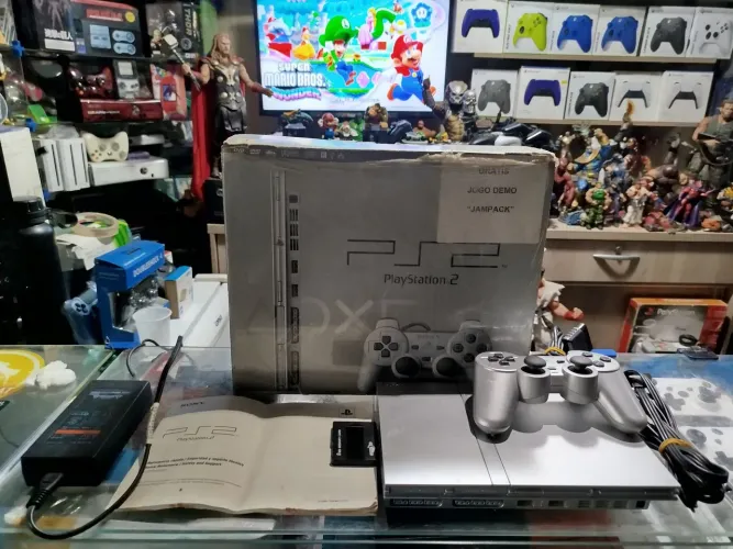 Playstation 2 slim prata controle original leitor 100% completo na cx ac trocas.. 