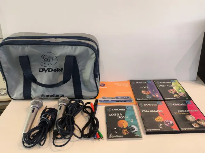 Acessórios Gradiente Dvdoke - 2 microfones - manual - Dvdoke músicas+ bolsa gradiente