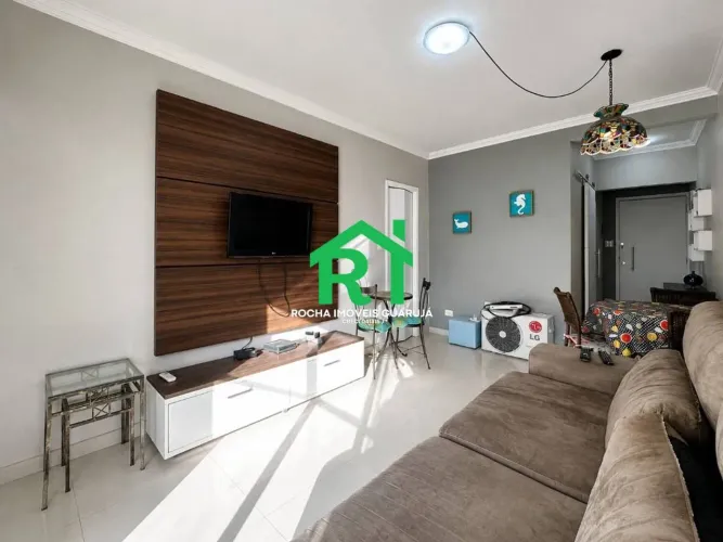 Apartamento beira mar com 2 quartos (2 suítes), 2 vagas à venda em Pitangueiras, Guarujá.