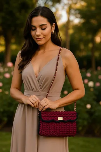 Bolsa carteira confeccionada em fio de malha