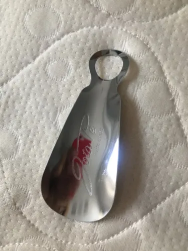 Calçadeira de metal