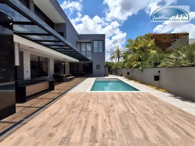 Casa com 4 dormitórios à venda, 550 m² por R$ 5.800.000,00 - Condomínio Campo de Toscana -