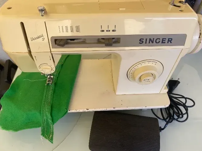 Máquina de costura singer