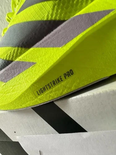 ADIZERO EVO SL WOVEN VERDE FLUORESCENTE