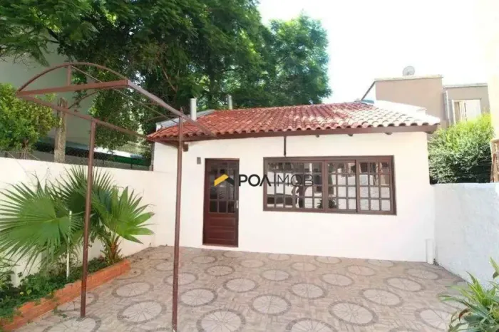 Casa com 4 dormitórios para alugar, 200 m² por R$ 6.806,00/mês - Independência - Porto Ale