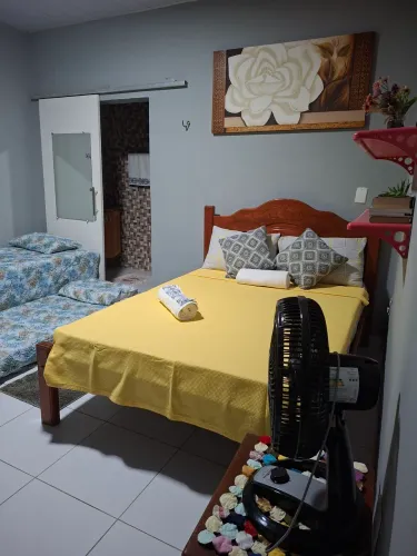 Quarto confortável para o círio