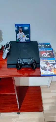 Playstation 4 impecável, acompanha 2 controles original ? e 4 jogos mídia física..!
