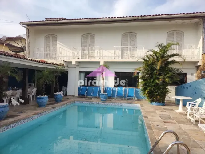 Casa com 5 dormitórios à venda, 393 m² por R$ 2.500.000,00 - Indaiá - Caraguatatuba/SP