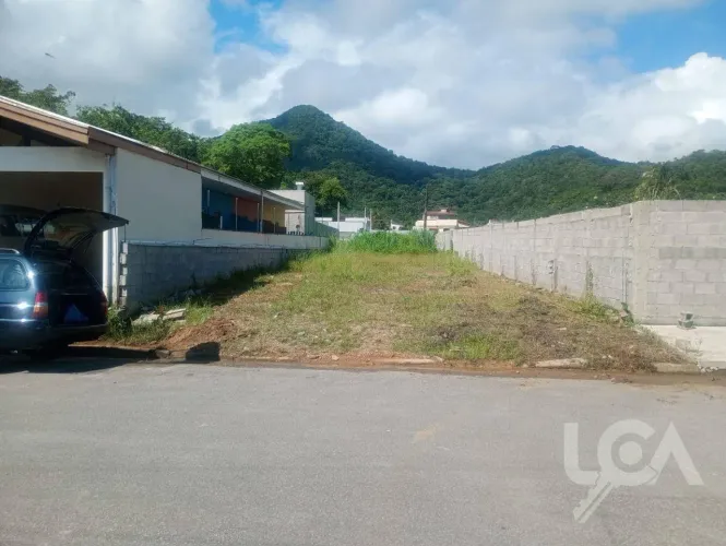 Terreno à venda, 252 m² por R$ 250.000 - Massaguaçu - Caraguatatuba/SP
