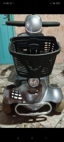 Scooter Elétrica Cadeira de Rodas Motorizada Freedom Mirage RX com Ré na casa e cinzA