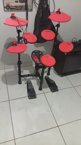 Bateria elétrica portátil laranja semi nova