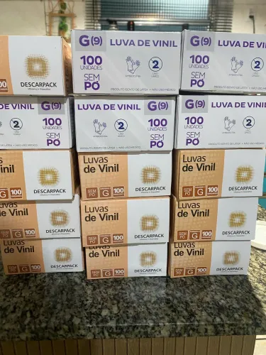 Luvas vinil tamanho G . Cx com 100 unidades. 9,90