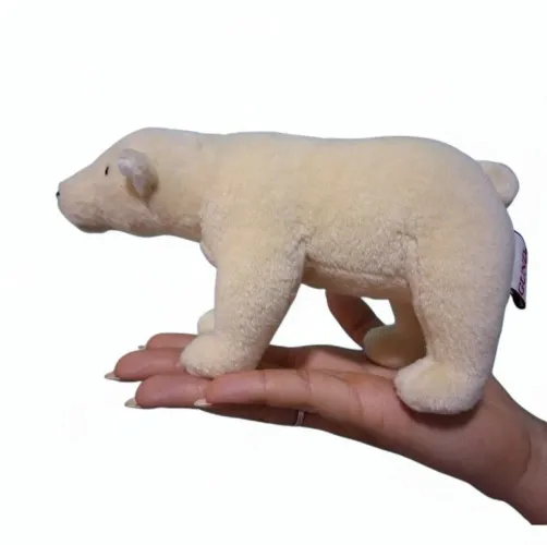 Boneco de pelúcia ursinha Nur
