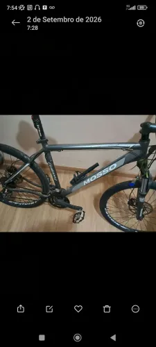 Bicicleta Mosso Odyssei aro 26 27v Shimano, suspensão rockshox