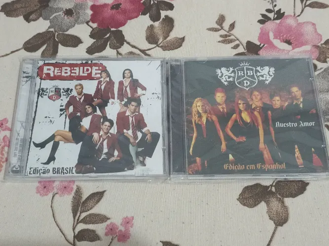 CDs RBD - Rebelde (Edição Brasil) & Nuestro Amor (Edição em Espanhol)