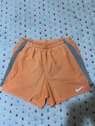 shorts nike challenger laranja