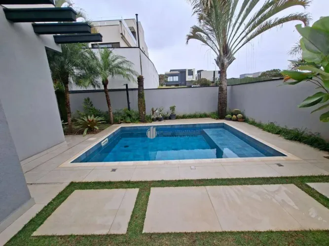Casa com 3 dormitórios à venda, 290 m² por R$ 3.150.000,00 - Condomínio Residencial Alphav