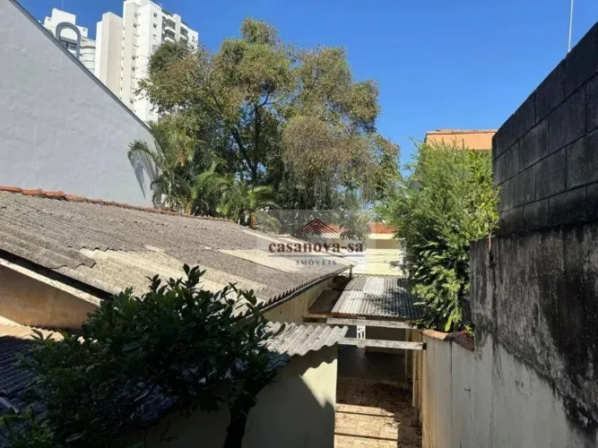 Casa terrea com 3 dormitórios para alugar, 150 m² por R$ 3.000/mês - Vila Floresta - Santo