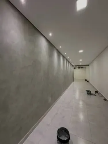 Cimento queimado em parede por M2 mão de obra