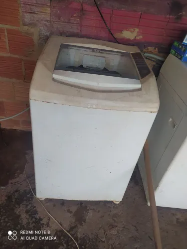Máquina de lavar com defeito 