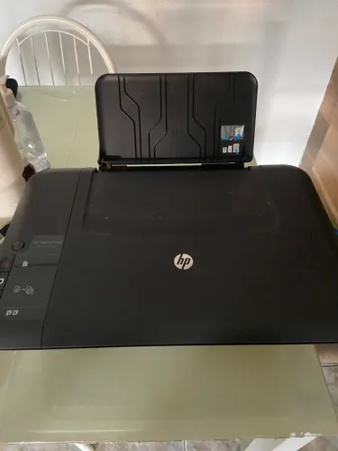  impressora é a HP Deskjet F2050 ? uma multifuncional que imprime, copia e digitaliza.