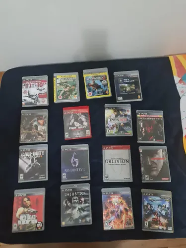 Lote de 15 jogos na caixa de PS3