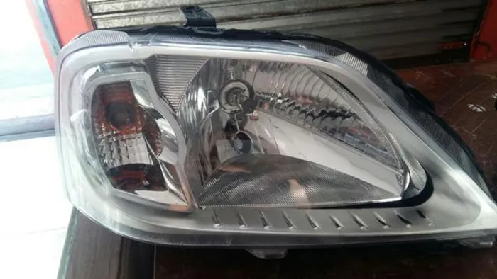 Farol logan 2007 2010