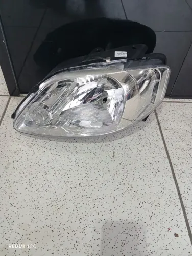 Farol Fox esquerdo simples 2003 a 2009