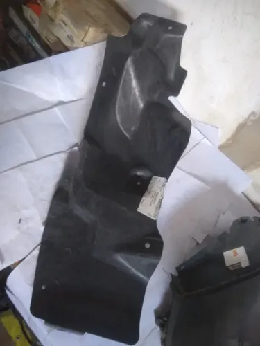 Forro Caixa Roda Traseira Dir Sonic Sedan *