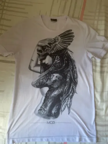 Camiseta Estampada MCD relíquia comprei tem mais de 7 anos atrás bom estado 