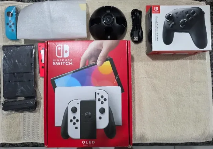 Nintendo Switch OLED + Pro controle + acessórios