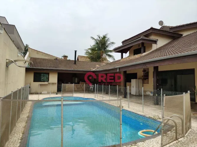 Casa com 6 dormitórios à venda, 440 m² por R$ 2.500.000,00 - Condomínio Ibiti do Paço - So