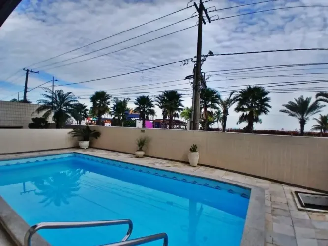 Imóvel para venda possui 87 metros quadrados com 2 quartos em Guilhermina - Praia Grande -