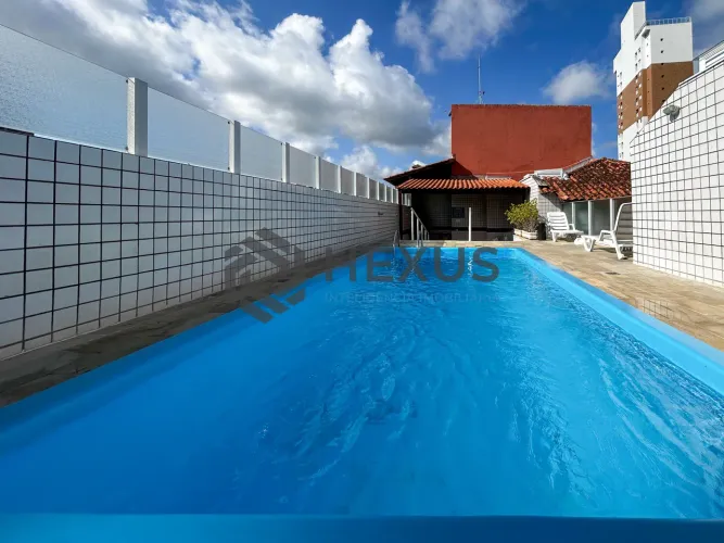 Apartamento com varanda e lazer a 150m da praia na Enseada, Guarujá