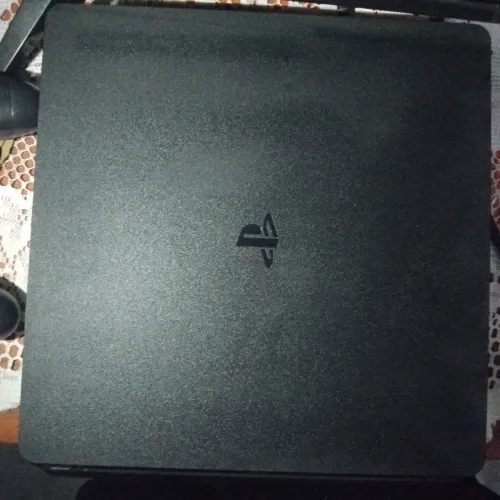 PLAY STATION SLIM 1 TERA DE MEMORIA + CONTROLE ORIGINAL NOVO + JOGOS DISCOS E DIGITAL