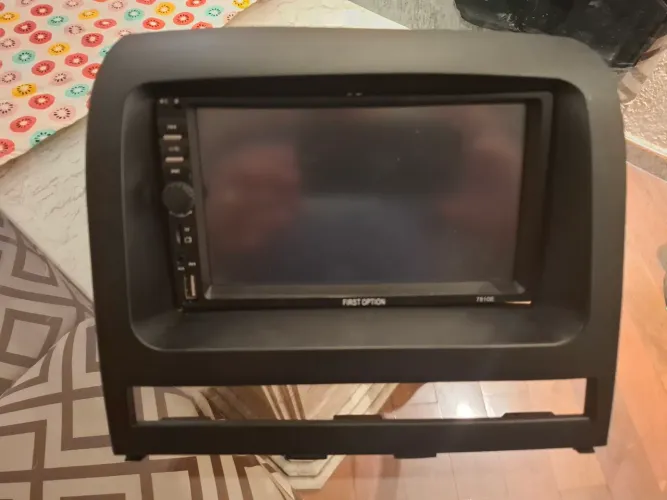 Multimidia com moldura fiat idea