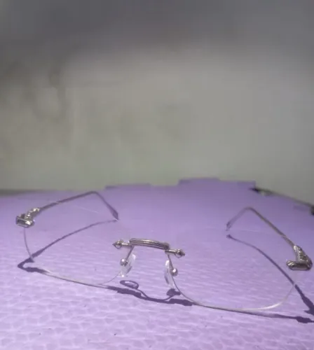 Óculos Lente Transparente com armação de prata