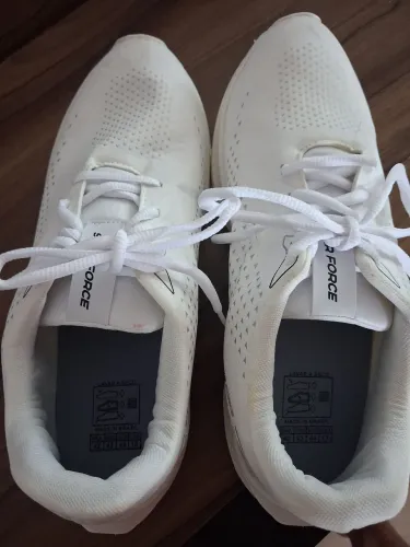 Tenis de corrida