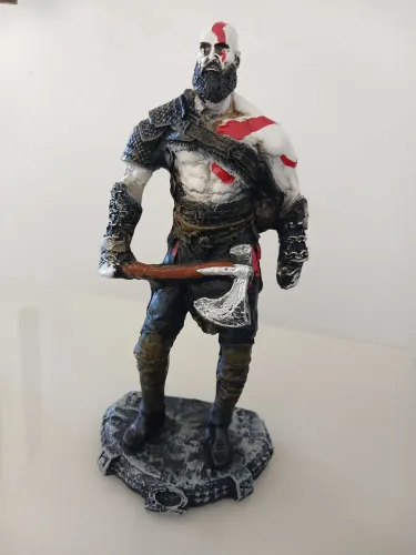 Boneco de resina