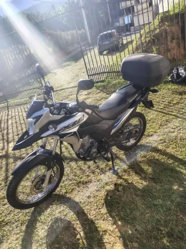 Vendo moto Honda ótimo estado