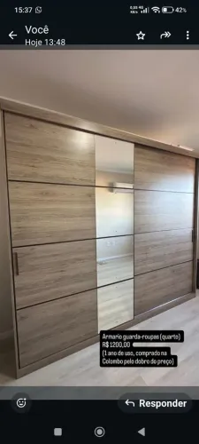 Guarda roupa com espelho