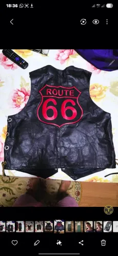 Colete de couro motociclista